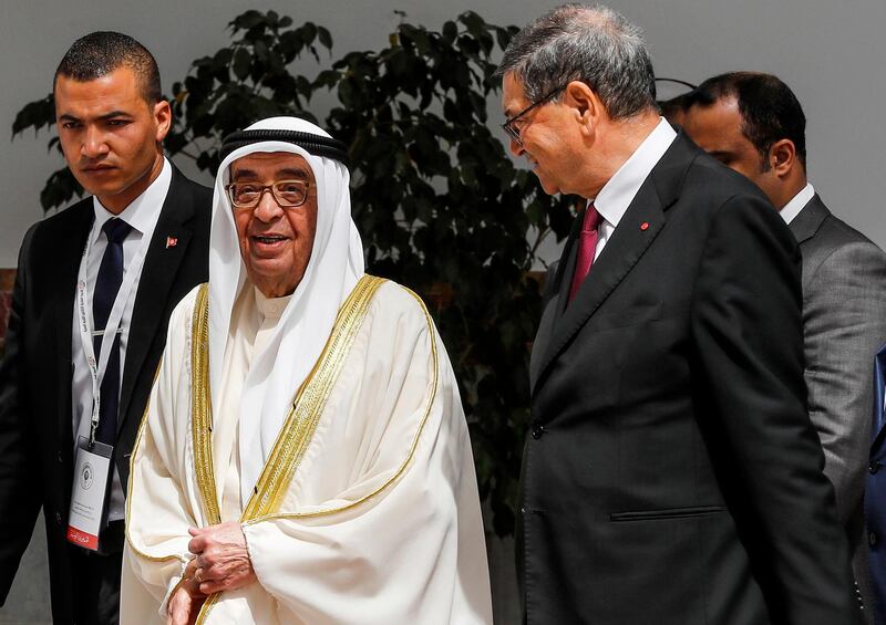 Sheikh Mohammad bin Mubarak al-Khalifa, centre left, Bahrain's deputy prime minister, is received by with Habib Essid, Tunisian Presidential Advisor for political affairs, upon his arrival at Tunis-Carthage International Airport. AFP