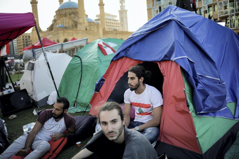 Protesters sit outside tents at Martyr's square in downtown Beirut, Lebanon November 2, 2019. REUTERS/Andres Martinez Casares
