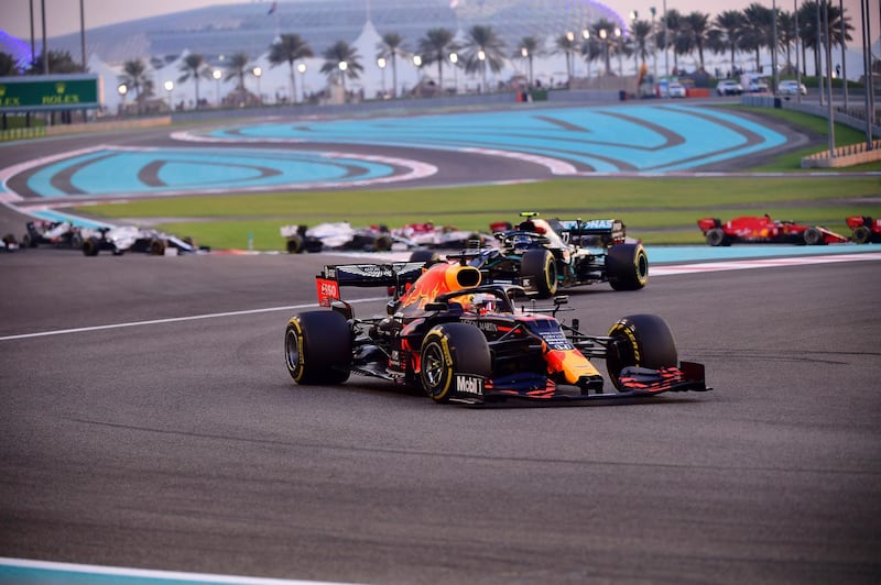 Red Bull driver Max Verstappen of the Netherlands leeads at the start of the Formula One Abu Dhabi Grand Prix in Abu Dhabi, United Arab Emirates, Sunday, Dec. 13, 2020. (Giuseppe Cacace, Pool via AP)