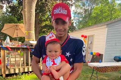 Daunte Wright holds his son, Daunte Jr, at his first birthday party.  Wright was fatally shot by former police officer Kim Potter during a traffic stop in April. Ben Crump Law, PLLC / AP