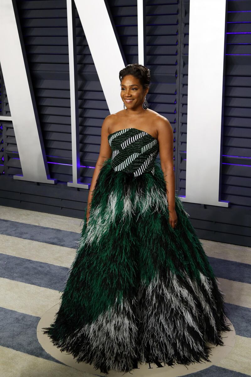 epa07396173 Tiffany Haddish poses at the 2019 Vanity Fair Oscar Party following the 91th annual Academy Awards ceremony, in Beverly Hills, California, USA, 24 February 2019. Green and white embellished dress by Rami Kadi. The Oscars are presented for outstanding individual or collective efforts in 24 categories in filmmaking.  EPA-EFE/NINA PROMMER