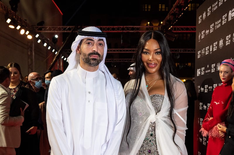 Red Sea Film Festival chairman Mohamed Turki poses with British model Naomi Campbell at the event's closing ceremony. AFP