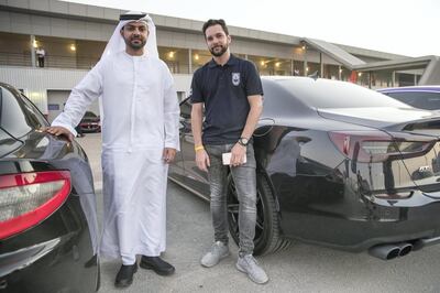 DUBAI, UNITED ARAB EMIRATES. 25 October 2017. Maserati Owners Club meet up event at the Dubai Autodrome. Co-Founders of the club Emirati Abdu Alaziz and American Casey Coker. (Photo: Antonie Robertson/The National) Journalist: Adam Workman. Section: Motoring.