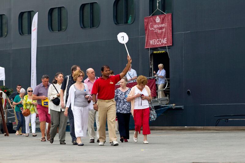 Abu Dhabi, United Arab Emirates, January 29, 2013:    Passengers disembark from the Queen Mary 2 ocean liner docks for the first time at Mina Zayed in Abu Dhabi on January 29, 2013. Christopher Pike / The National