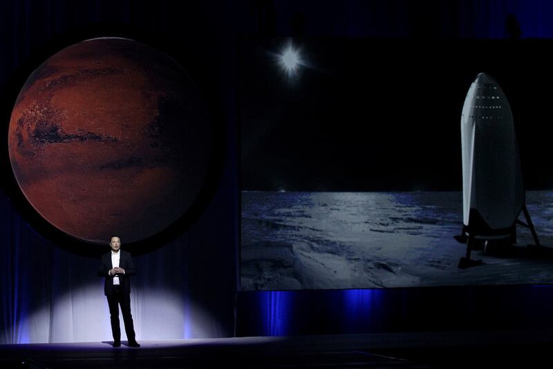 Mr Musk presents his plan to colonise Mars at the International Astronautics Congress in Guadalajara, Mexico, in 2016 EPA