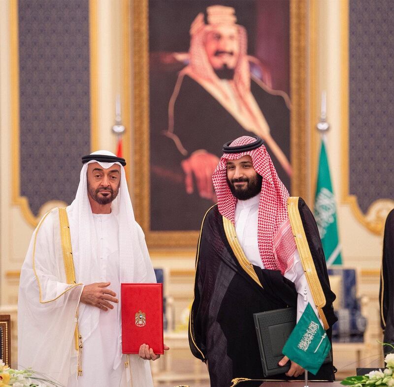 Abu Dhabi's Crown Prince Sheikh Mohammed bin Zayed al-Nahyan poses for a photo with Saudi Crown Prince Mohammed bin Salman during the Saudi-UAE Summit in Jeddah, Saudi Arabia, June 6, 2018. Picture taken June 6, 2018. Bandar Algaloud/Courtesy of Saudi Royal Court/Handout via REUTERS ATTENTION EDITORS - THIS PICTURE WAS PROVIDED BY A THIRD PARTY