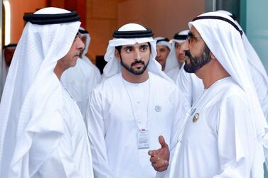 Sheikh Mohammed Bin Rashid speaks with Shiekh Saif bin Zayed, Deputy Prime Minister and Minister of Interior, and Sheikh Hamdan bin Mohammed, Crown Prince of Dubai, while attending the Arab Strategy Forum. Dubai Media Office