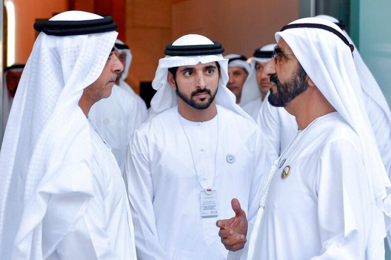 Sheikh Mohammed Bin Rashid speaks with Sheikh Saif bin Zayed, Deputy Prime Minister and Minister of Interior, and Sheikh Hamdan bin Mohammed, Crown Prince of Dubai, while attending the Arab Strategy Forum. Dubai Media Office