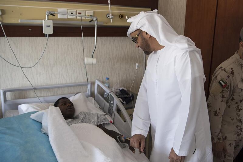 Sheikh Mohammed bin Zayed, Crown Prince of Abu Dhabi and Deputy Supreme Commander of the Armed Forces, visits a Sudanese soldier injured while serving in Yemen, at Zayed Military Hospital. Hamad Al Kaabi / Crown Prince Court — Abu Dhabi