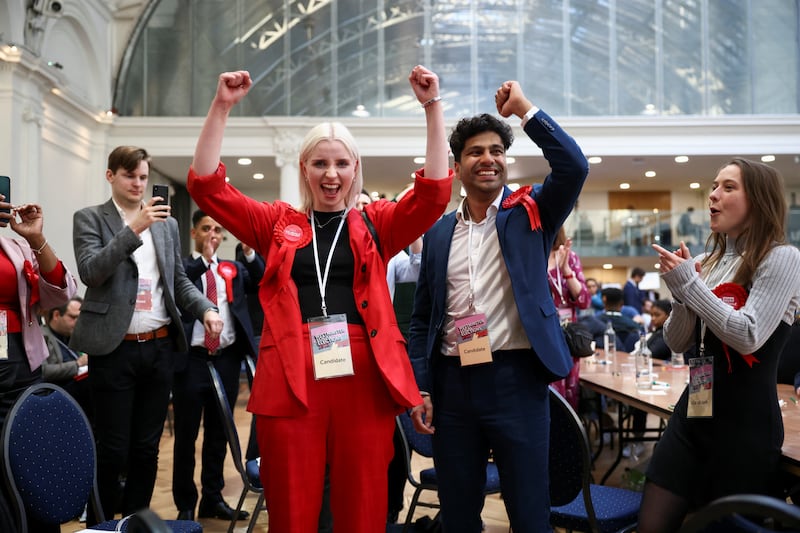 British Labour Party candidates and supporters celebrate after making gains in the Westminster City Council elections in London. Reuters