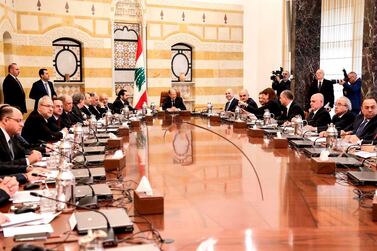 Lebanese President Michel Aoun chairs the new government's first cabinet meeting, accompanied by Prime Minister Saad Hariri at the presidential palace in Baabda. AFP
