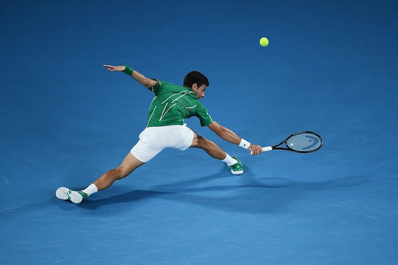 Novak Djokovic plays a backhand. Getty