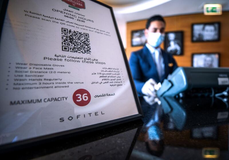 Abu Dhabi, United Arab Emirates, July 12, 2020.   
Sofitel Abu Dhabi Corniche Hotel with updated Covid-19 precautionary measures.  A maximum capacity sign located at the reception of the Parmigiana Italian Restaurant.
Victor Besa  / The National
Section:  Standalone
Reporter:
