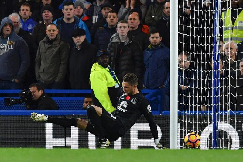Everton goalkeeper Maarten Stekelenburg cannot stop the shot from Chelsea’s Marcos Alonso (not pictured). Ben Stansall / AFP