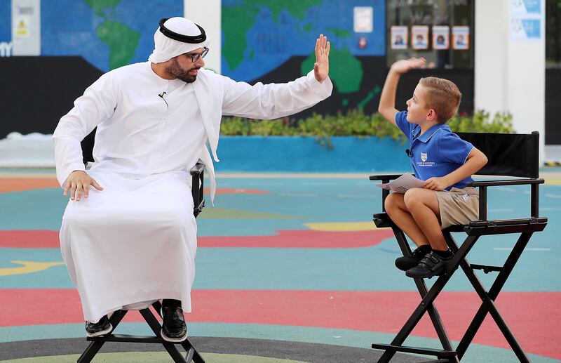 ABU DHABI , UNITED ARAB EMIRATES , OCT 8   ��� 2017 :-  Mohamed Khalifa Al Mubarak , Aldar Academies Chairman interacting with Alexander Mansoor ( right )  year 2 student during the promotional video shoot about Aldar Academies celebrating 10 years of business at the Pearl Academy in Abu Dhabi. ( Pawan Singh / The National ) Story by Roberta