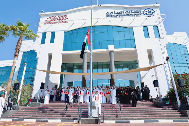 Essam Issa Al Humaidan, Dubai attorney general and employees of Dubai Public Prosecution take part in UAE flag day. Photo: DPP