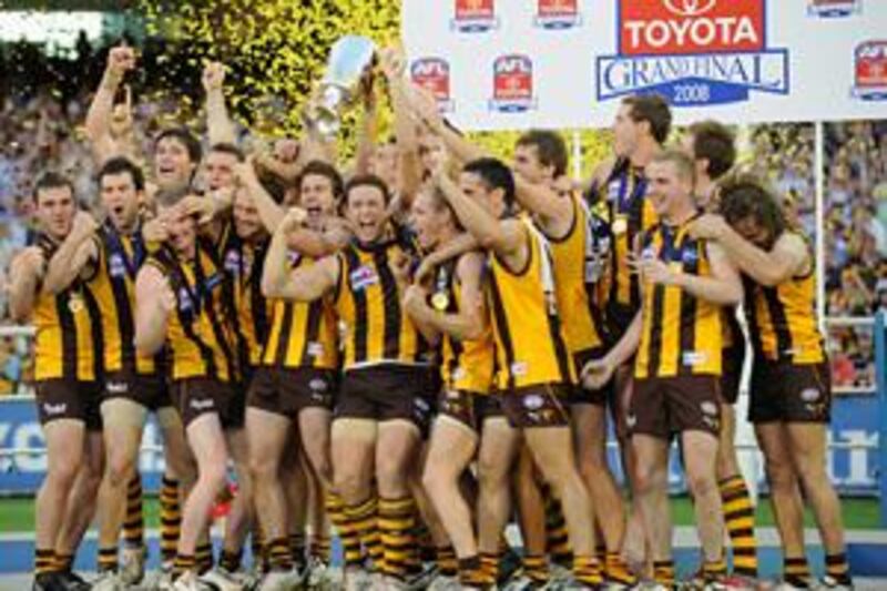 Hawthorn players celebrate winning the 2008 grand final following victory over Geelong at the MCG.