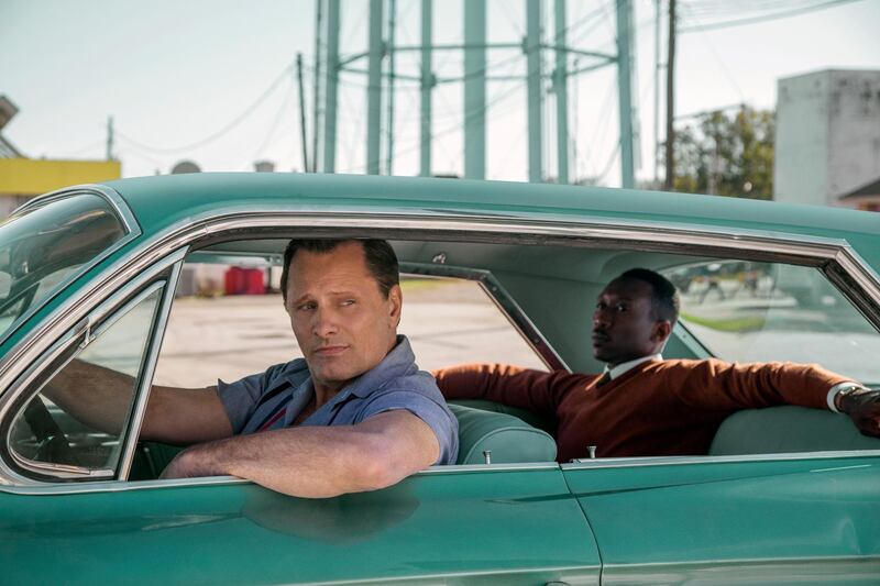 This image released by Universal Pictures shows Viggo Mortensen, left, and Mahershala Ali in a scene from "Green Book." On Thursday, Dec. 6, 2018, the film was nominated for a Golden Globe award for best motion picture musical or comedy. The 76th Golden Globe Awards will be held on Sunday, Jan. 6. (Patti Perret/Universal Pictures via AP)