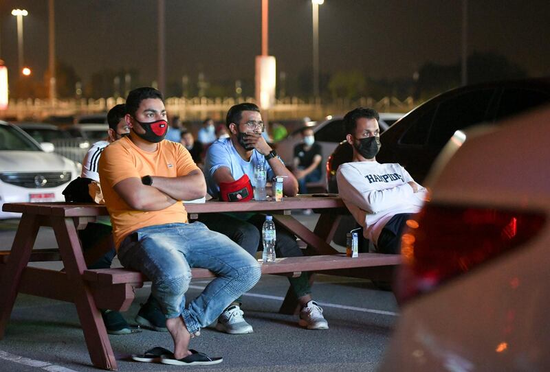 Drive-in Match Screening-AD Die hard football fans viewing the outdoor screening of the Manchester City Football Club against Chelsea Football Club game at Zayed Sports complex in Abu Dhabi on May 29, 2021. Khushnum Bhandari / The National 
Reporter: N/A Sports