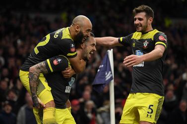 Danny Ings of Southampton celebrates with teammate Nathan Redmond. Getty