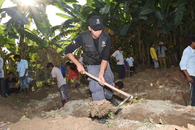 A volunteer from Dubai Cares digs foundations for the primary school in Barkamuda, Nepal, which will cater for 150 pupils. The project is part of the group’s Volunteer Globally 2014. Courtesy Dubai Cares 