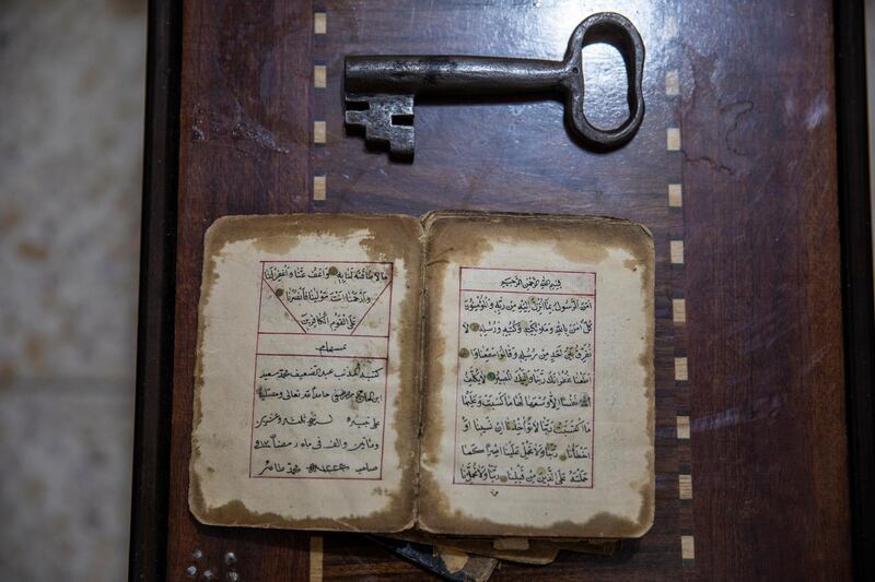 A 200 years old hand written copy of the Muslims holy book the Quran, and an old house key belonging to the family of Palestinian refugee  Palestinian refugee Hana Khalel Emselem Edieb, on a table in Baqa'a Palestinian refugee urban camp, near Amman, Jordan.  Ms. Abu Kecheck is originally from a village near Yafa in what used to be Palestine, she left her village with her family to flee expected violence first around 1948 but as an internally displaced person. She moved out again to Kuwait to follow her husband in 1960, but they had to leave Kuwait and move to to Baqa'a Palestinian refugee urban camp in the wake of the first Gulf War in 1990.  World Refugee Day is marked annually on 20 June. EPA