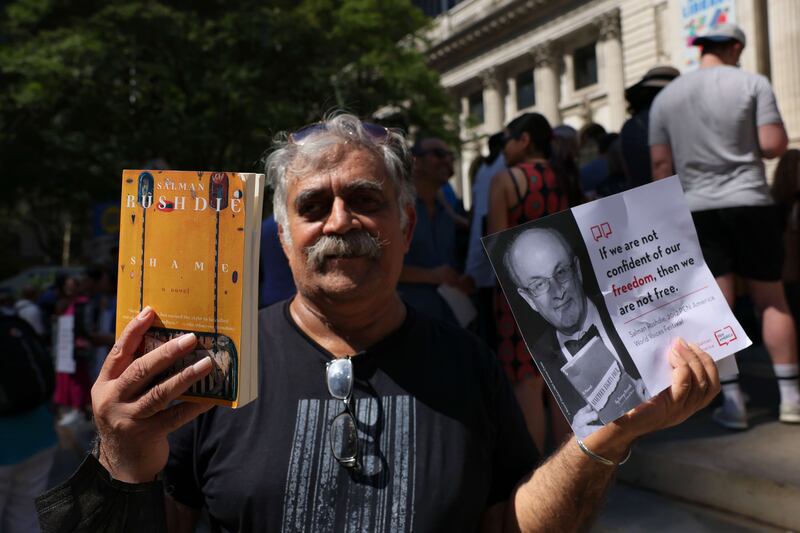 Hasan Mujtaba, a poet of Pakistani origin, attends the event.  Getty Images / AFP
