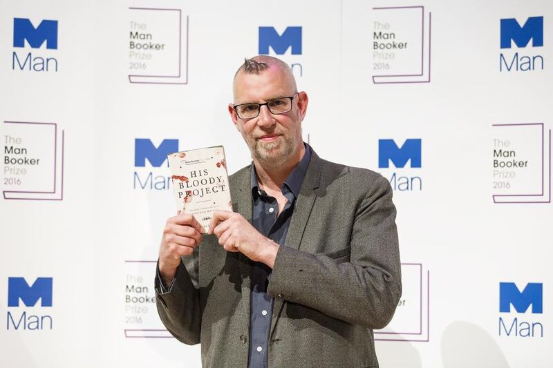 Author Graeme Macrae Burnet with his book, His Bloody Project, which was shortlisted for this year’s Man Booker Prize. Tristan Fewings / Getty Images 