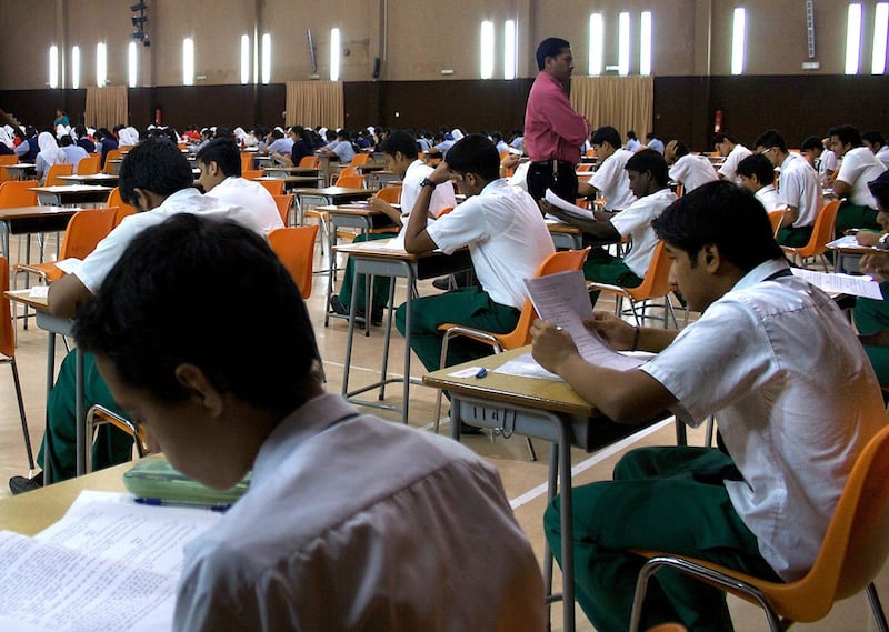 Abu Dhabi, UAE - March 4, 2009, 650 Indian students taking their public exam in the auditorium of the Abu Dhabi Indian School.