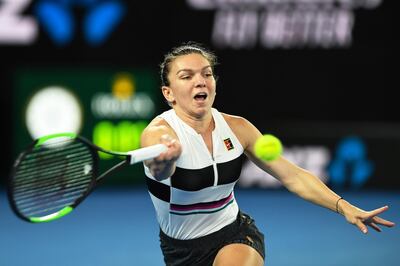 epa07292010 Simona Halep of Romania in action against Sofia Kenin of the USA during their women's second round match of the Australian Open Grand Slam tennis tournament in Melbourne, Australia, 17 January 2019.  EPA/JULIAN SMITH AUSTRALIA AND NEW ZEALAND OUT