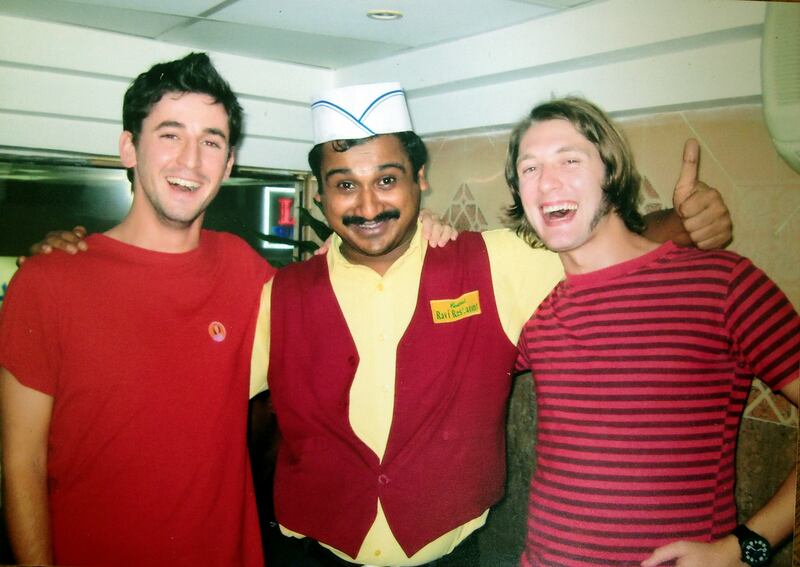 From left: Alex Ritman, his favorite waiter and friend Andy Tillett at Baithal Ravi in 2009. Courtesy Alex Ritman