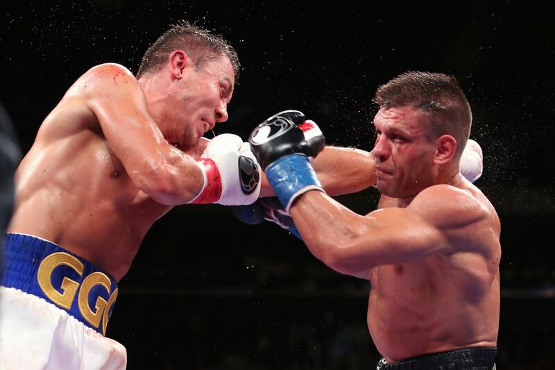 Gennadiy Golovkin, left, is hit by Sergiy Derevyanchenko during the seventh round of an IBF middleweight championship title bout at Madison Square Garden. AP Photo