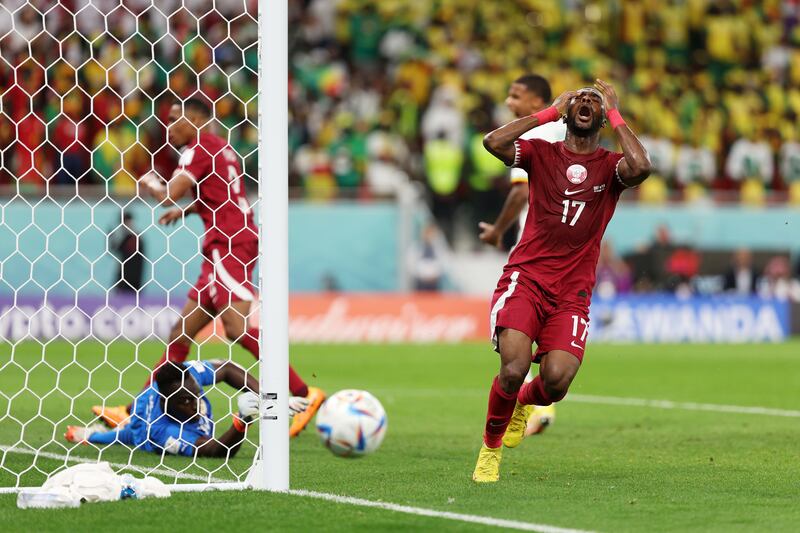 Qatar's Ismail Mohama after a missed chance in the second half. Getty