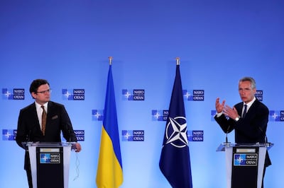 NATO Secretary General Jens Stoltenberg and Ukrainian Foreign Minister Dmytro Kuleba give a press conference in Brussels, Belgium, April 13, 2021. Francisco Seco/Pool via REUTERS