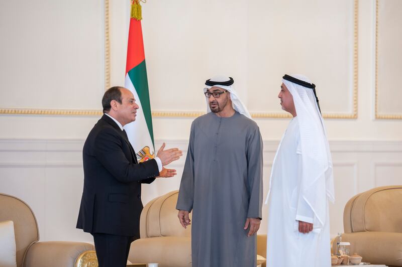 Mr El Sisi offers condolences to Sheikh Mohamed, with Sheikh Dr Sultan bin Khalifa, adviser to the UAE President. Rashed Al Mansoori / Ministry of Presidential Affairs