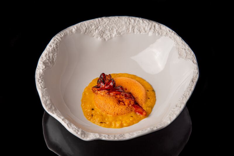 Tresind Studio's charred lobster tail, pickled tomato and corn curry. Photo: Tresind Studio