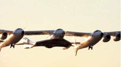 Virgin Galactic's carrier airplane WhiteKnightTwo carrying a space tourism rocket plane SpaceShipTwo takes off from Mojave Air and Space Port in Mojave, California, U.S. in a still image from video December 13, 2018. Virgin Galactic/Handout via REUTERS.  ATTENTION EDITORS - THIS IMAGE WAS PROVIDED BY A THIRD PARTY. NO ARCHIVES, NO SALES.