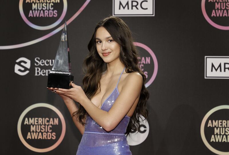 Olivia Rodrigo, winner of the New Artist Of The Year award, poses in the Press Room at the 2021 American Music Awards at Microsoft Theatre on November 21, 2021 in Los Angeles. Getty Images / AFP