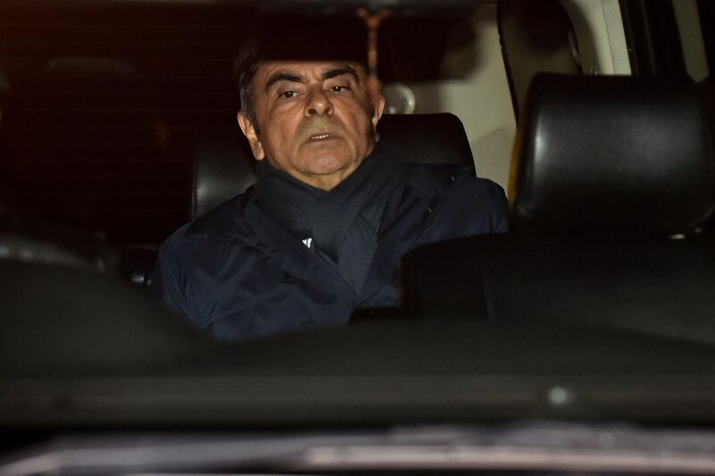 (FILES) This file photo taken on April 3, 2019 shows former Nissan chairman Carlos Ghosn leaving his lawyer's office in Tokyo. Former Nissan boss Carlos Ghosn was reportedly charged on April 22, 2019 with allegedly financial misconduct, the fourth set of formal charges against the former auto sector tycoon. / AFP / Kazuhiro NOGI
