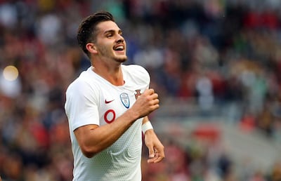 Portugal's Andre Silva celebrates after scoring the opening goal during a friendly soccer match between Portugal and Tunisia in Braga, Portugal, Monday, May 28, 2018. (AP Photo/Armando Franca)