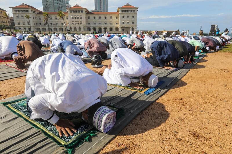 epa08578244 Muslims devotees gather to perform Eid al-Adha prayer at the Galle Face Seafront in Colombo, Sri Lanka, 01 August 2020. Eid al-Adha is the holiest of the two Muslims holidays celebrated each year, it marks the yearly Muslim pilgrimage (Hajj) to visit Mecca, the holiest place in Islam. Muslims slaughter a sacrificial animal and split the meat into three parts, one for the family, one for friends and relatives, and one for the poor and needy.  EPA/CHAMILA KARUNARATHNE