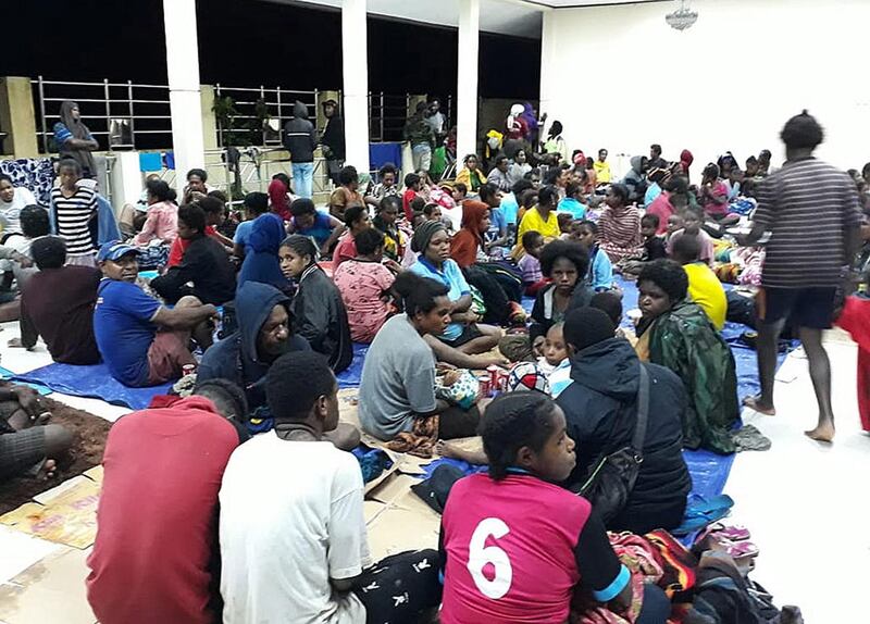 epa07443968 A handout made available by Indonesia's National Disaster Management Agency (BNPB) shows residents gathering at a temporary shelter as flash flood affect the area in Sentani, near Jayapura, Papua province, Indonesia, 17 March 2019. At least 42 people were killed and 21 injured as a flash floods hit Sentani, according to Sutopo Purwo Nugroho, a spokesman for the National Disaster Management Agency.  EPA/BNPB / HANDOUT BEST QUALITY AVAILABLE HANDOUT EDITORIAL USE ONLY/NO SALES