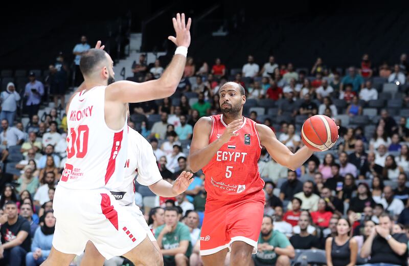 Egypt (in red) take on Lebanon (white) during the International Basketball Week in Abu Dhabi on August 17 2023. Pawan Singh / The National