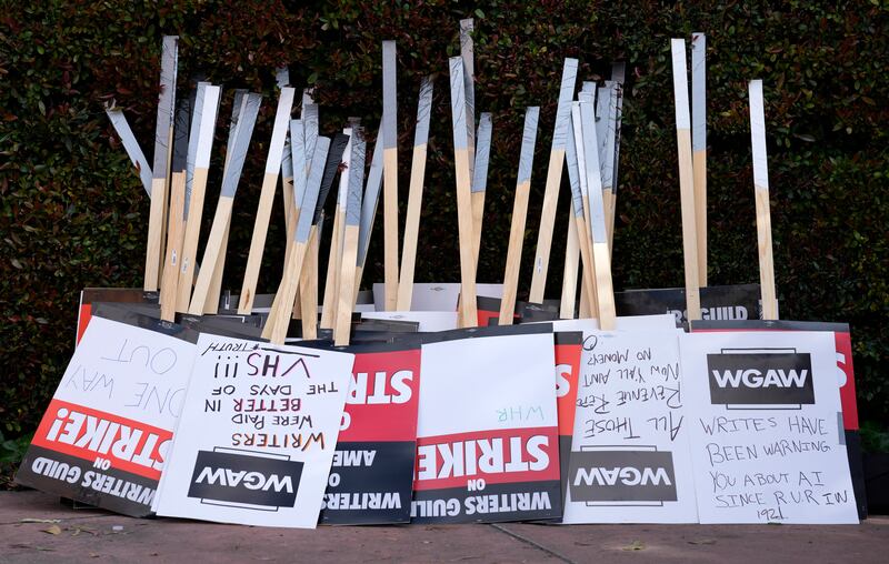 Placards at the close of a picket by members of The Writers Guild of America outside Walt Disney Studios. AP Photo