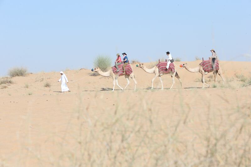 Guests with Balloon Adventure Dubai are also treated with camel rides on a private camp