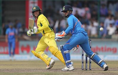Australia's Usman Khawaja plays a reverse sweep shot during the final one day international cricket match between India and Australia in New Delhi, India, Wednesday, March 13, 2019. (AP Photo/Altaf Qadri)