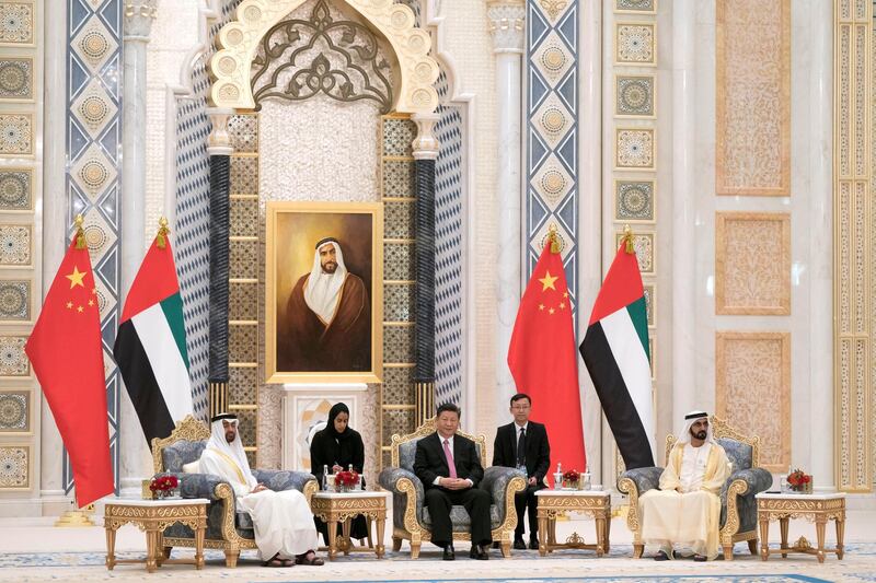 ABU DHABI, UNITED ARAB EMIRATES - July 20, 2018:   HH Sheikh Mohamed bin Zayed Al Nahyan Crown Prince of Abu Dhabi Deputy Supreme Commander of the UAE Armed Forces (L), HH Sheikh Mohamed bin Rashid Al Maktoum, Vice-President, Prime Minister of the UAE, Ruler of Dubai and Minister of Defence (R) and HE Xi Jinping, President of China (C), witness an MOU exchange ceremony at the Presidential Palace.   

( Mohamed Al Hammadi / Crown Prince Court - Abu Dhabi )
---
