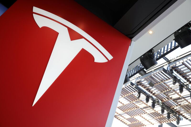 FILE PHOTO: A Tesla logo is seen in Los Angeles, California U.S. January 12, 2018. REUTERS/Lucy Nicholson - RC19527F9590/File Photo