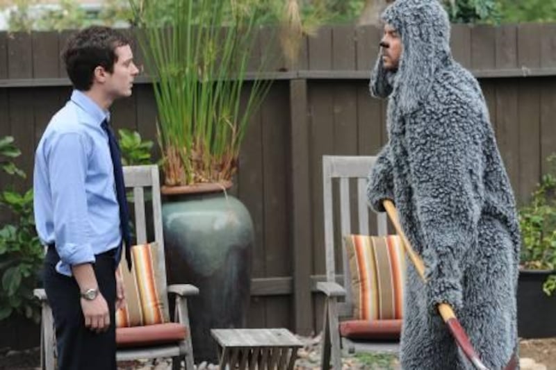 In this publicity image released by FX, Elijah Wood portrays Ryan, left, and Jason Gann portrays Wilfred in a scene from the FX comedy "Wilfred," airing  Thursdays at 10:00 p.m. EST on FX. (AP Photo/FX, Michael Becker)