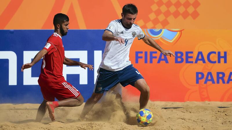 ASUNCION, PARAGUAY - NOVEMBER 24: Alexey Makarov of Russia is challenged by Ali Mohammed of United Arab Emirates during the FIFA Beach Soccer World Cup Paraguay 2019 group C match between Russia and United Arab Emirates at Estadio Mundialista Los Pynandi on November 24, 2019 in Asuncion, Paraguay. (Photo by Buda Mendes - FIFA/FIFA via Getty Images)